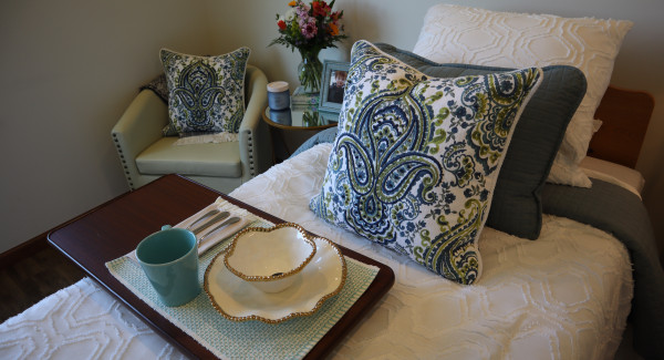 Room with bed and chairs